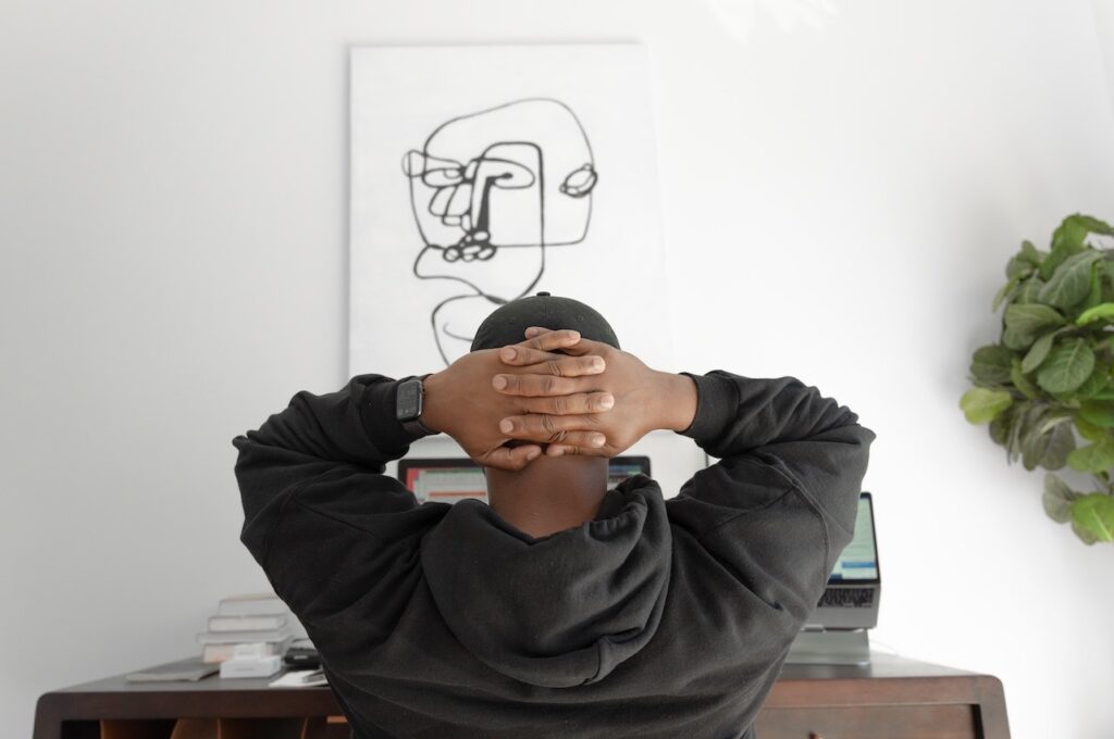 Man with hands on his head